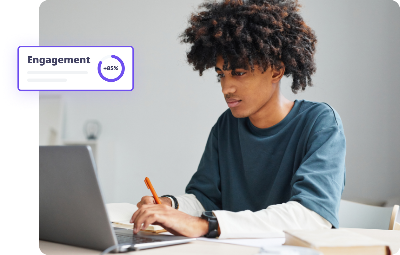 Young man focused on laptop with engagement metrics displayed on screen.
