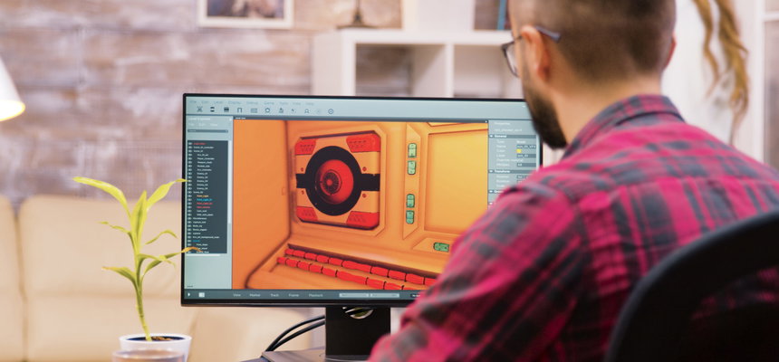 Close up shot of game developer working on a new level of game
