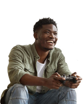 A black man playing video games with a console controller