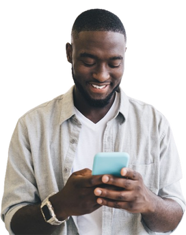 Smiling black man using smartphone