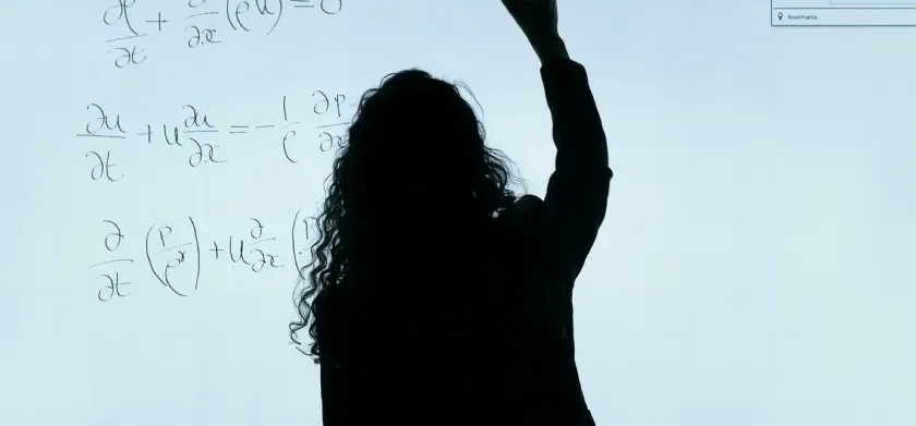 Woman writing on the blackboard - making MathML accessible
