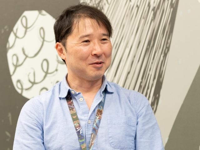 Man wearing a blue shirt.