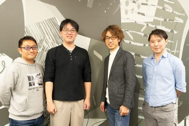 A group photo of four persons.