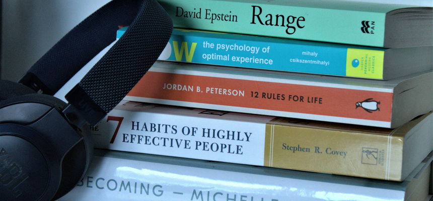 A stack of four books.