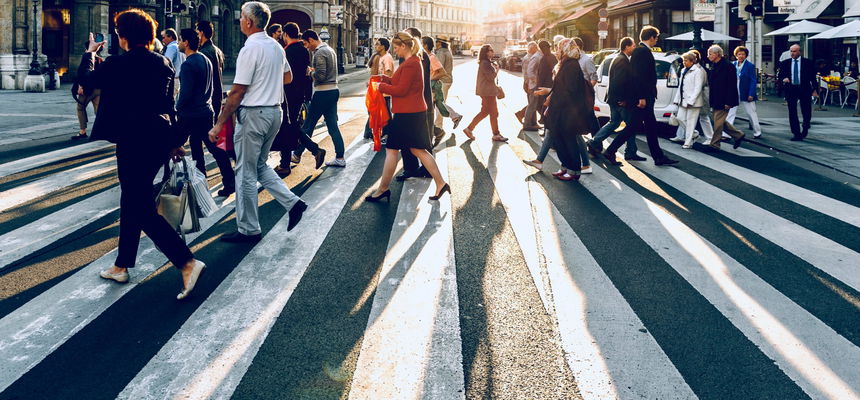 People crossing the road in a city