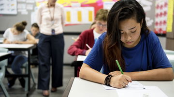 Students doing the exam in classroom