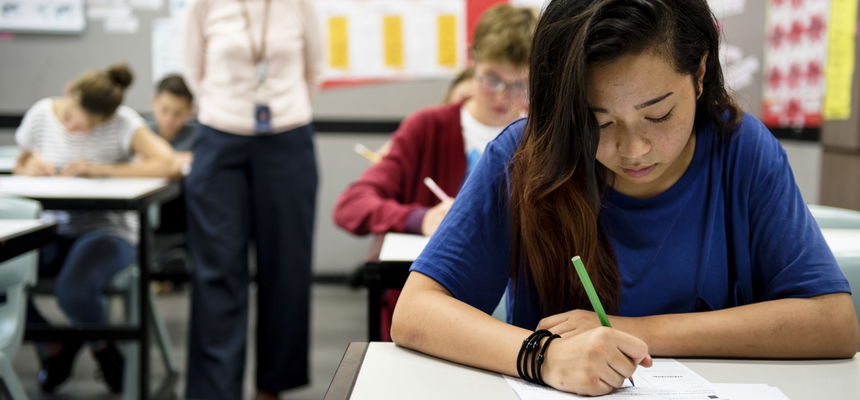 Students doing the exam in classroom